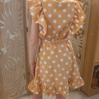 Robe beige à pois blancs