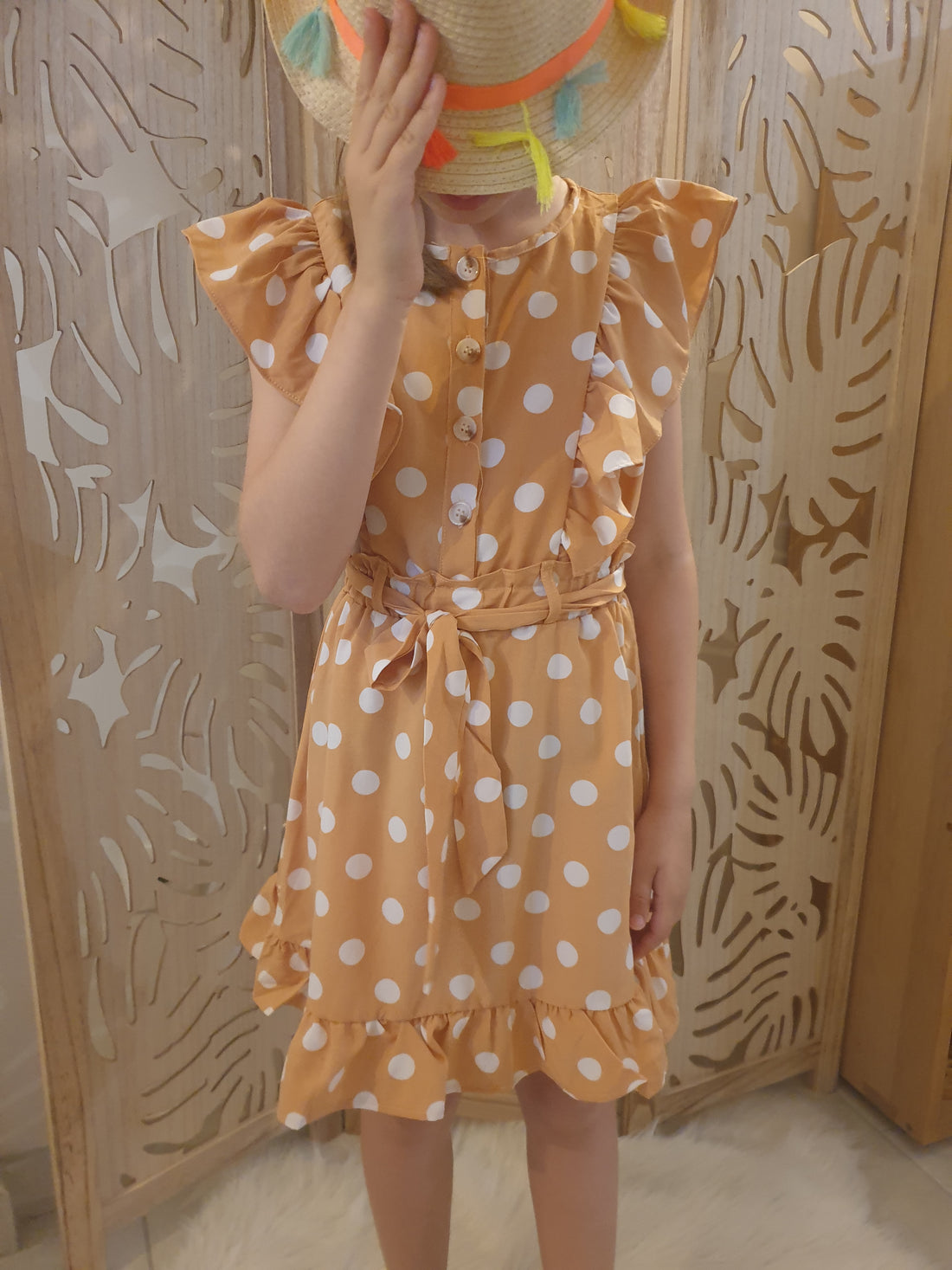 Robe beige à pois blancs