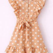 Robe beige à pois blancs