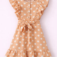 Robe beige à pois blancs